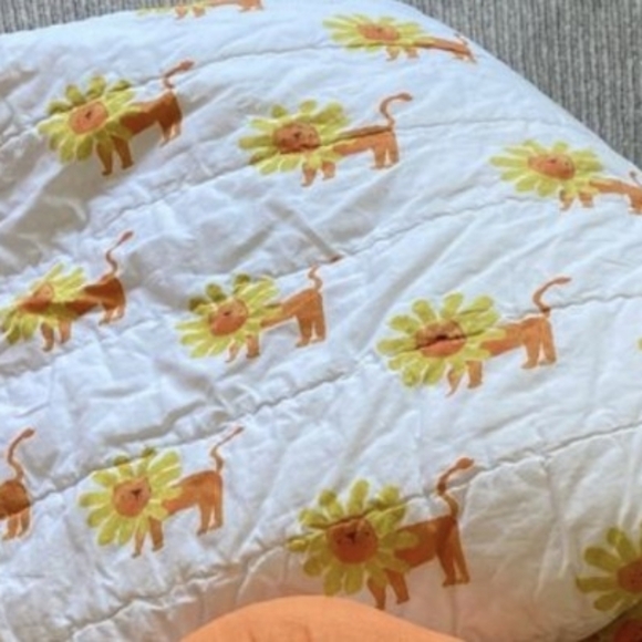 The Land of Nod Vibrant Orange and White Lion Quilt